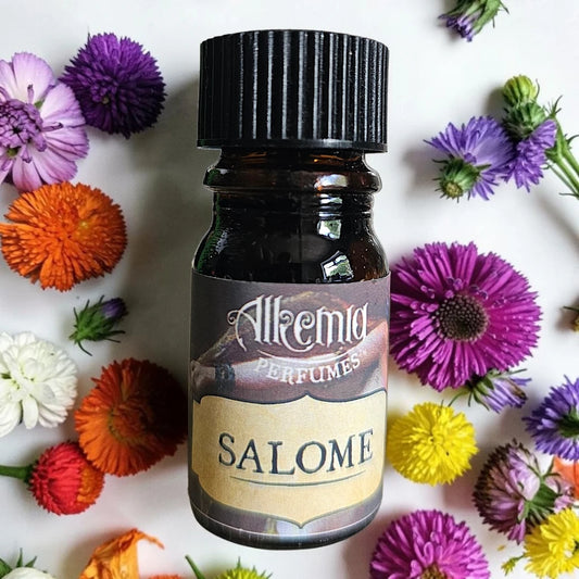 A small amber glass perfume bottle with a black ribbed cap and a label reading 'Alkemia Perfumes' and 'SALOME', centered on a white background and surrounded by colorful flowers.
Alkemia Salome fragrance samples UK 1ml sample available 