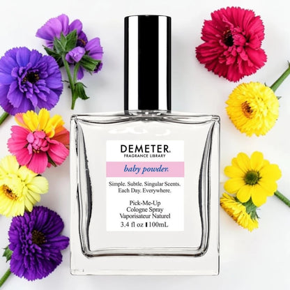 A bottle of Demeter Fragrance Library 'baby powder' cologne spray is centered on a white background, surrounded by colorful flowers including purple, pink, yellow, and red blossoms.
Demeter Fragrance Library Baby Powder | Fragrance Samples UK 1ml 2ml and 5ml perfume samples available 