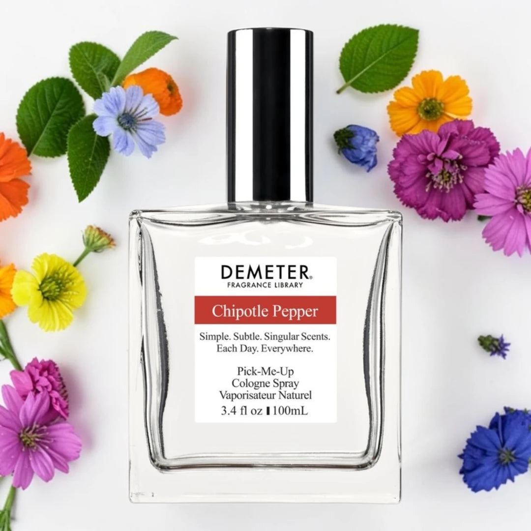 A bottle of Demeter Fragrance Library 'Chipotle Pepper' cologne spray, styled in a flat-lay with colorful flowers and green leaves on a white background.
Demeter Fragrance Library Chipotle Pepper | Fragrance Samples UK 1ml 2ml and 5ml samples available 