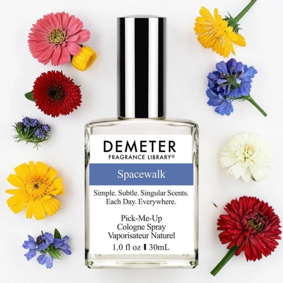 A bottle of Demeter Fragrance Library Spacewalk Cologne Spray is centered on a white background, surrounded by colorful flowers including pink, yellow, red, blue, and white.
Demeter Fragrance Library Spacewalk | Fragrance Samples UK 1ml 2ml and 5ml perfume samples available 