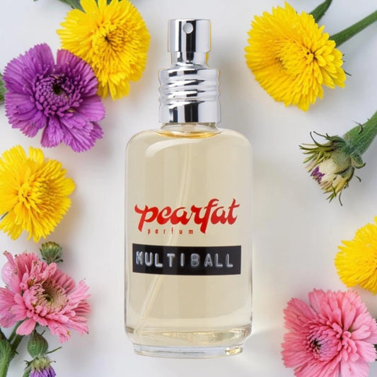 Pearfat Perfum Multiball perfume bottle with a silver spray cap, filled with pale yellow liquid, surrounded by yellow and pink flowers on a white background.
Pearfat Parfum Multiball | Fragrance Samples UK 1ml 2ml and 5ml perfume samples available 