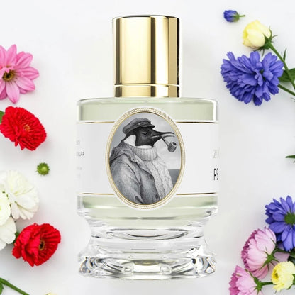 A clear glass perfume bottle with a shiny gold cap and a white label featuring a black-and-white illustration of a bird wearing a hat and sweater. The bottle is centered on a white background and surrounded by colorful flowers in pink, red, yellow, blue, and purple.
Zoologist Penguin | Fragrance Samples UK 1ml 2ml and 5ml perfume samples available
